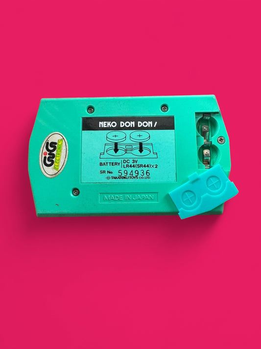 Battery Cover per Takatoku Toys – Neko Don Don – LCD Game_cod.066