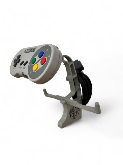 Stand/Espositore per Super Nintendo (SNES) e il suo Gamepad